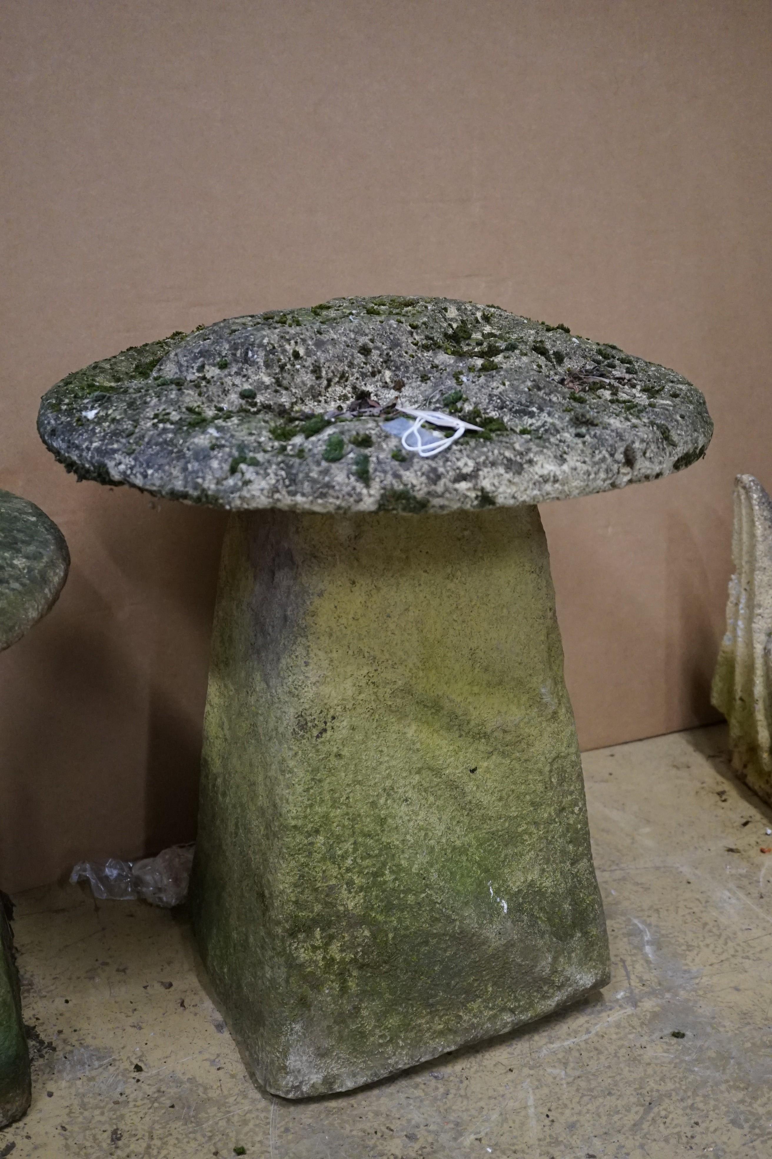 A carved stone staddle stone, height 64cm, diameter 54cm